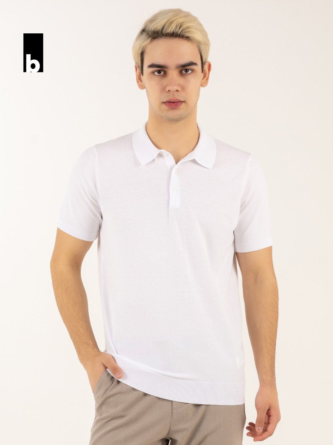 White knitted polo “Baza” with a button collar
