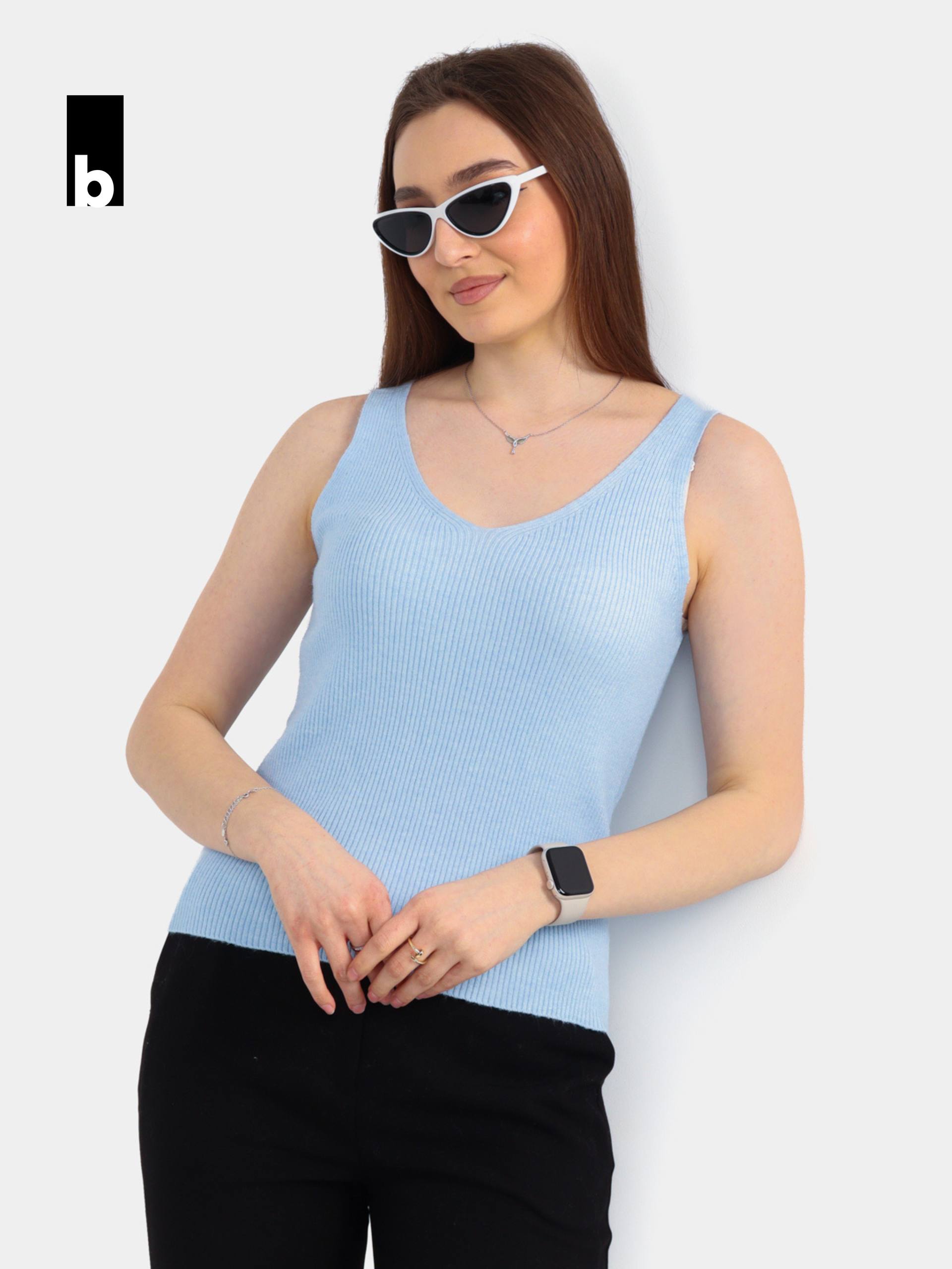 Light blue knitted top with shape retention and textured vertical knit