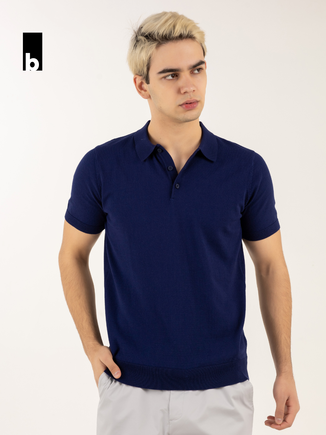 Blue knitted polo “Baza” with a button collar