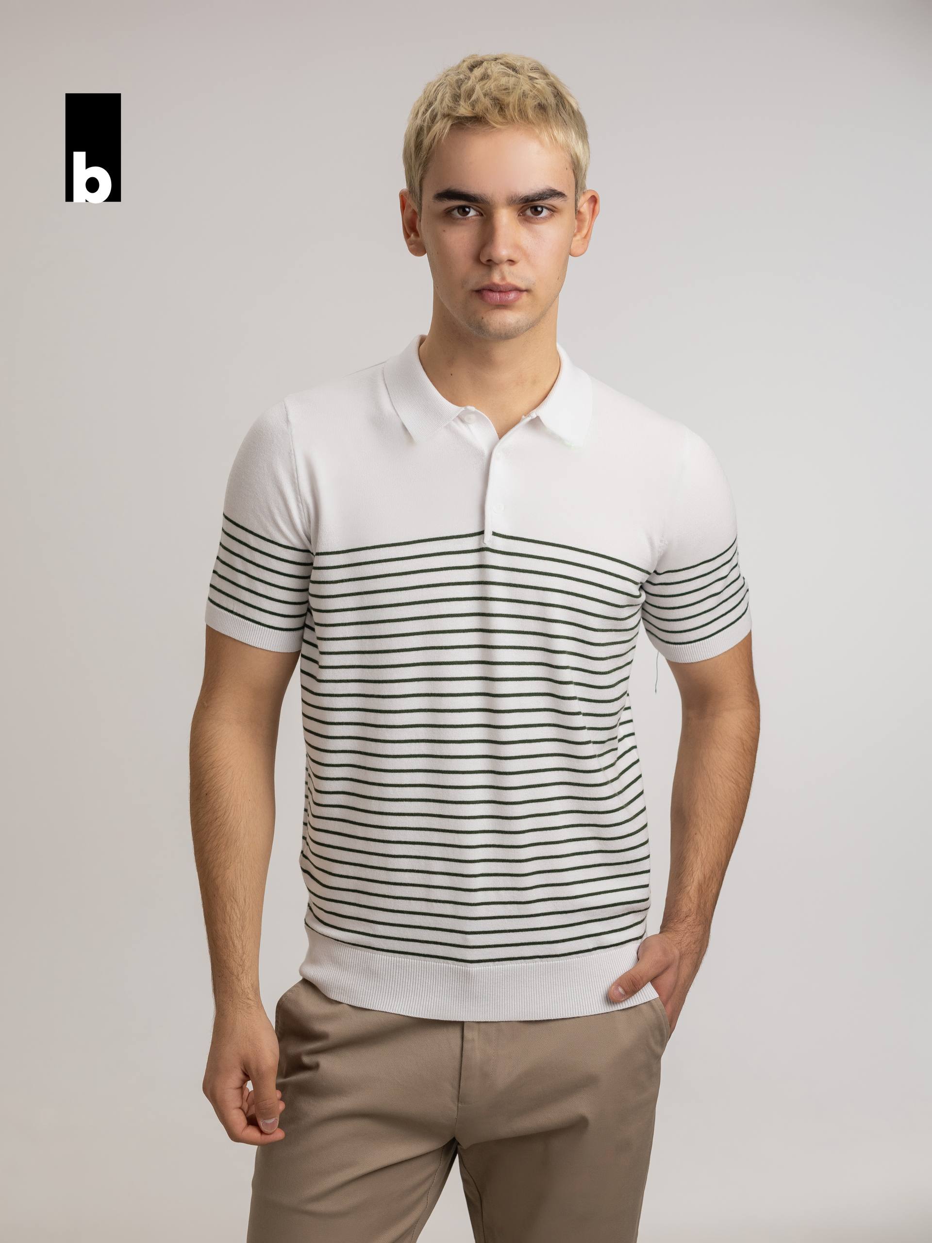 White knitted polo with shape retention and contrasting green stripe