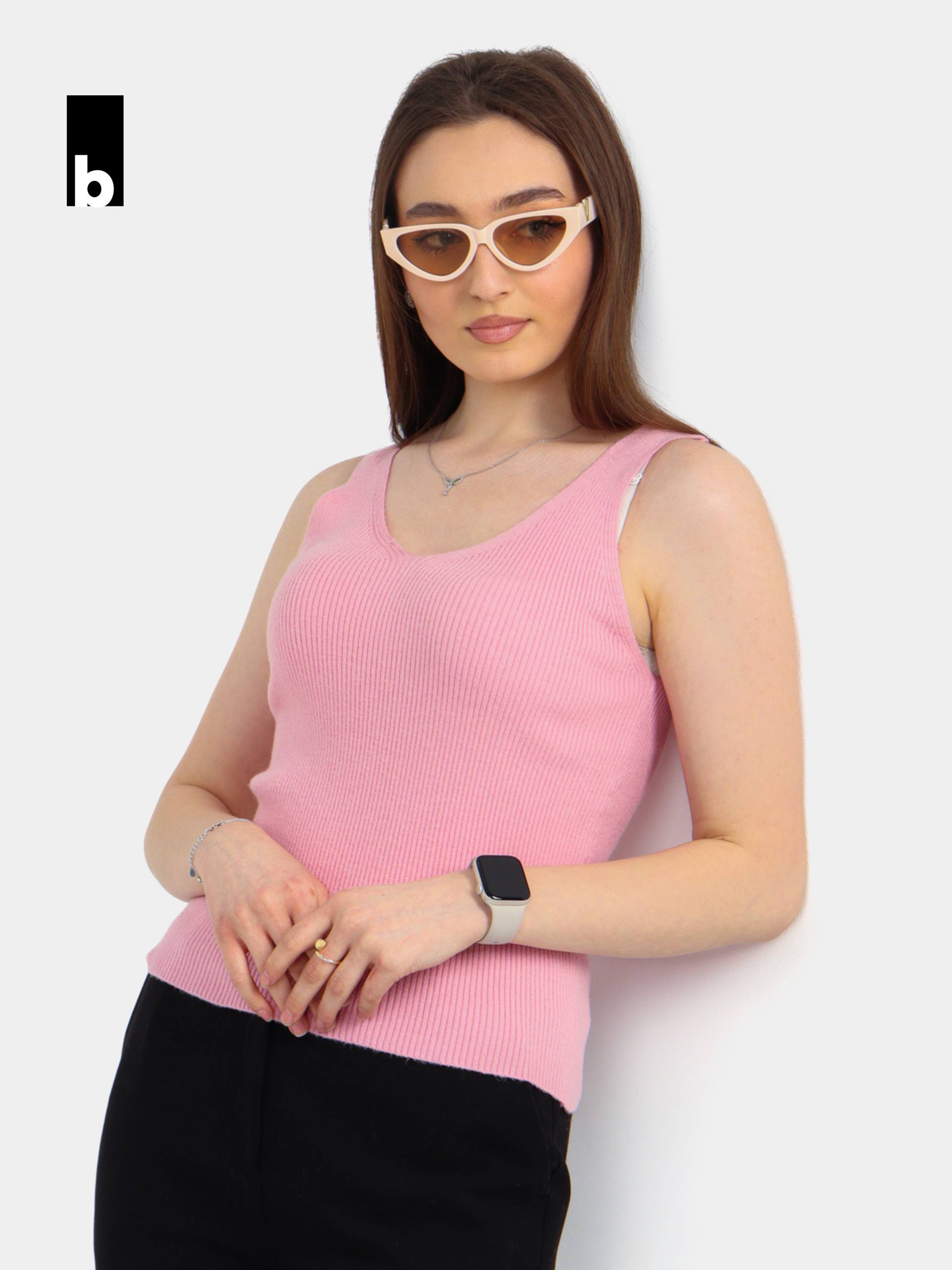 Pink knitted top with shape retention and textured vertical knit